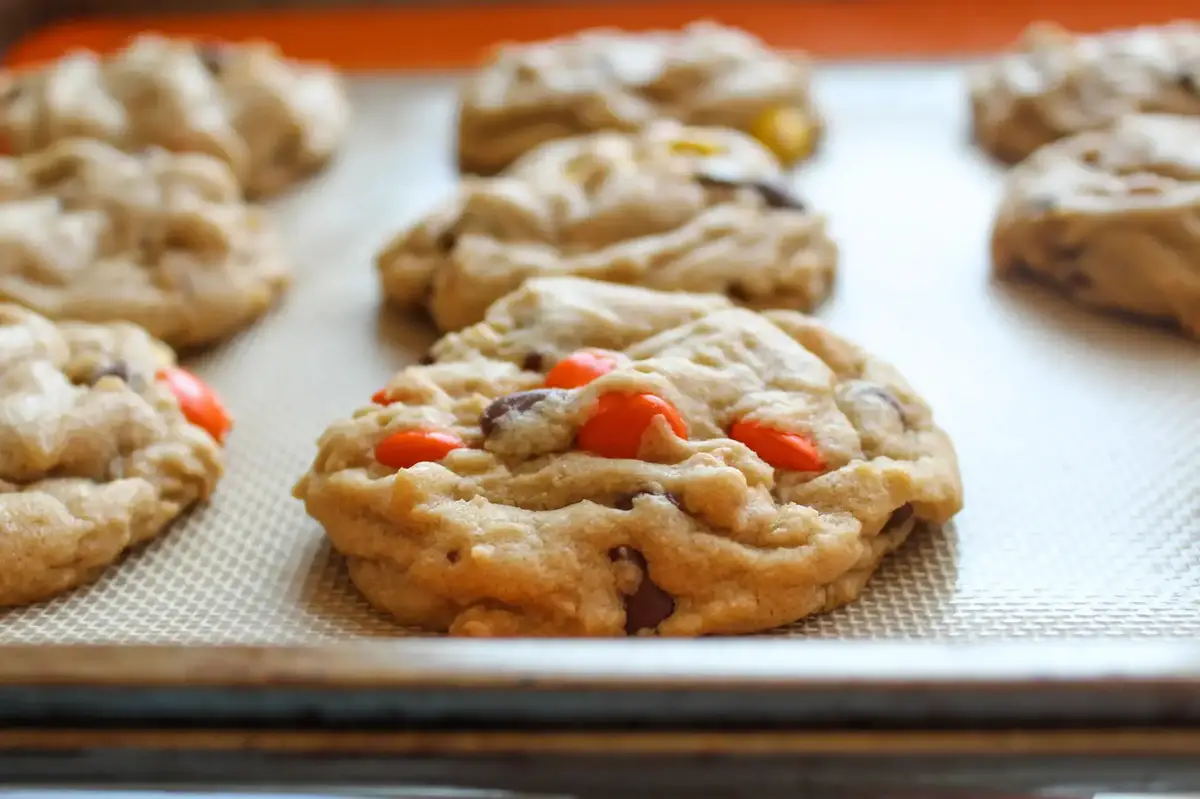 Beat butter and sugar in large bowl with mixer until fluffy. Reese S Pieces Peanut Butter Chocolate Chip Cookies Hungry Six